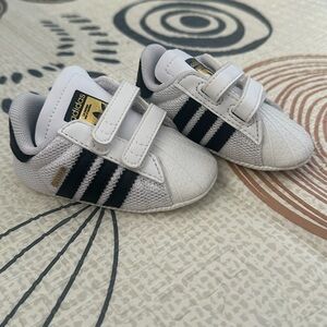 Never worn classic Adidas for infant